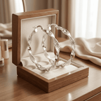 Csavaros ezüstös karika fülbevaló