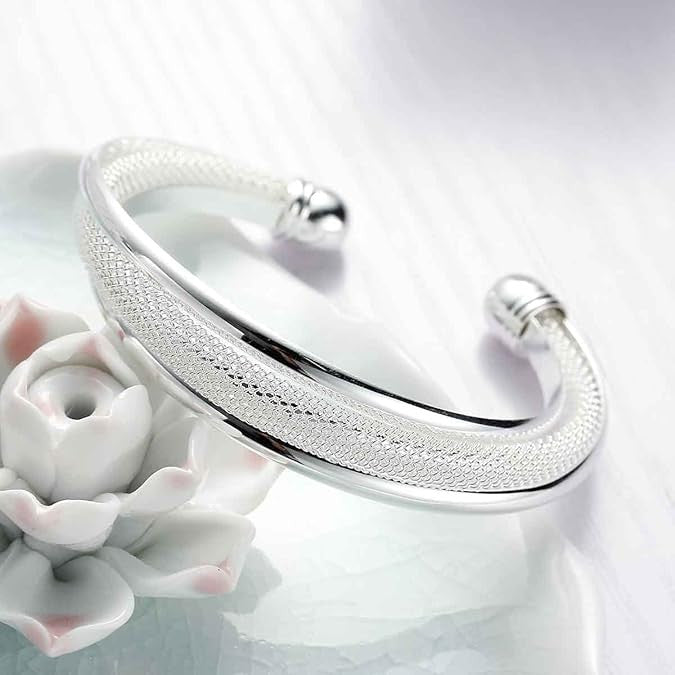 Ezüstös csavart karperec