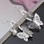 Ezüstös pillangók lógós fülbevaló