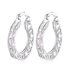 Ezüstös szív mintás karika fülbevaló