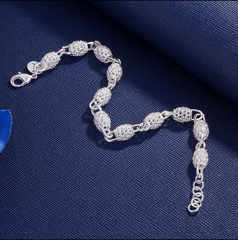 Ovál díszes ezüstös karkötő