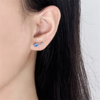 Angyalszárnyak fülbevaló kék kristállyal whitegold