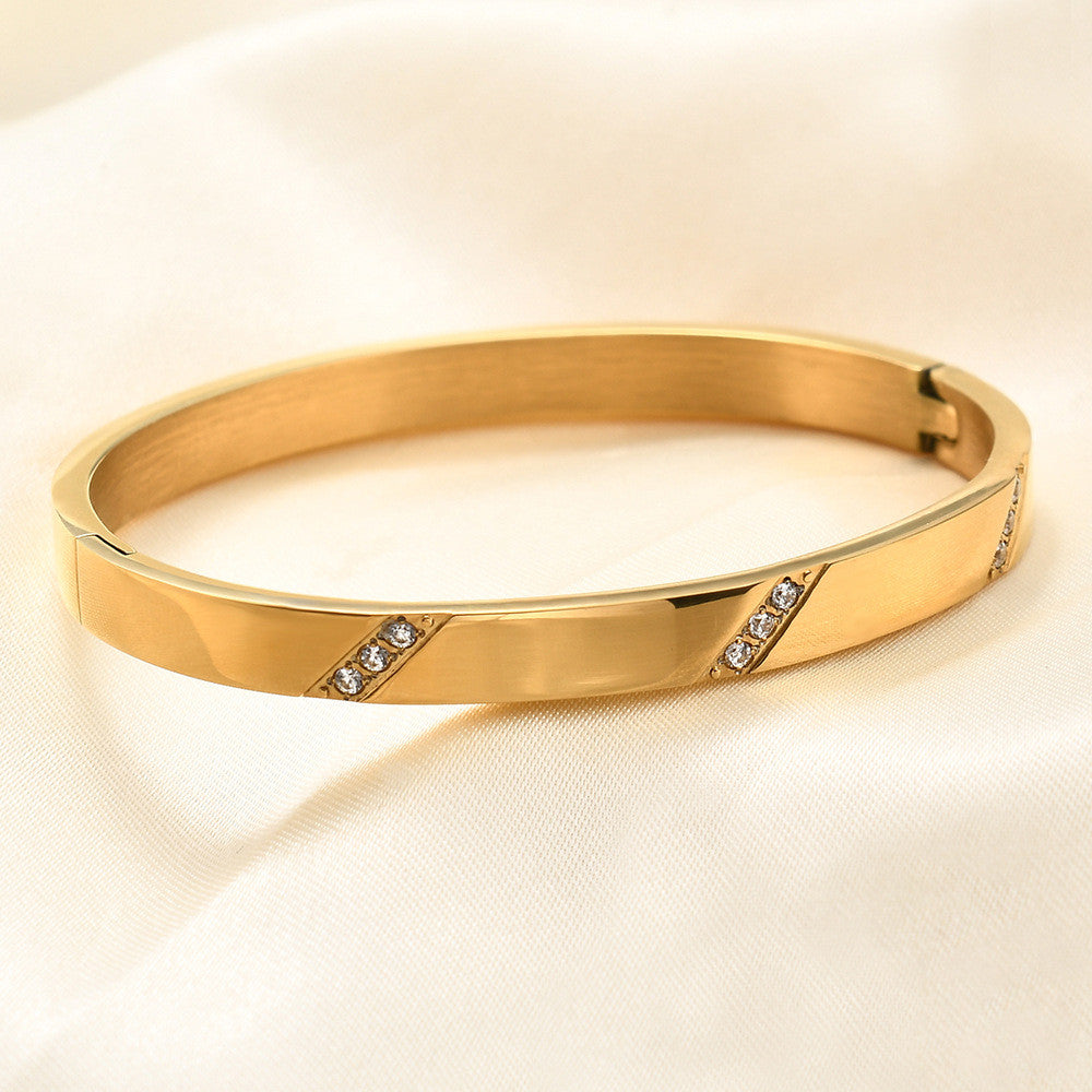 Nemesacél kristályköves karkötő gold