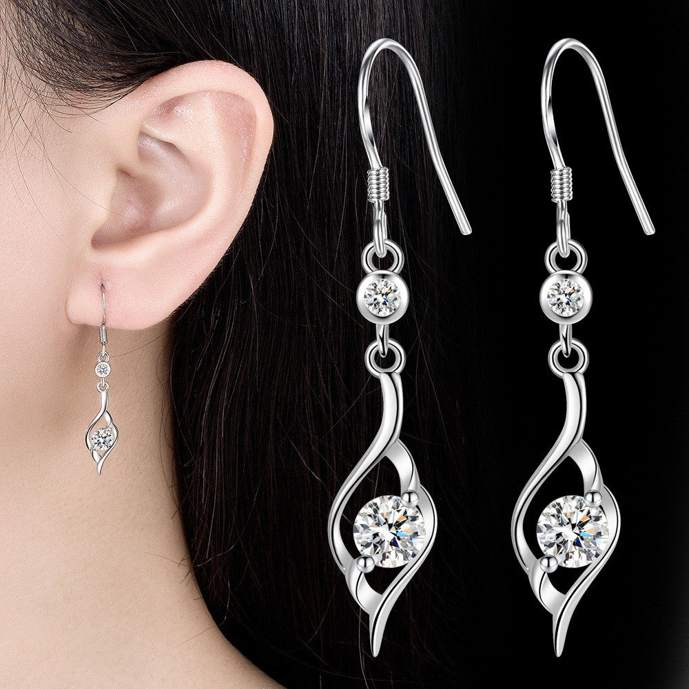 Csavart lógós fülbevaló whitegold