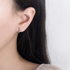 Csavart fülbevaló szívvel whitegold