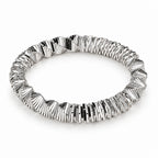 Csavart rugós nemesacél karkötő whitegold – stúdiófotó