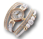 Exkluzív gyöngyös-kristálygolyós karkötőóra fehér