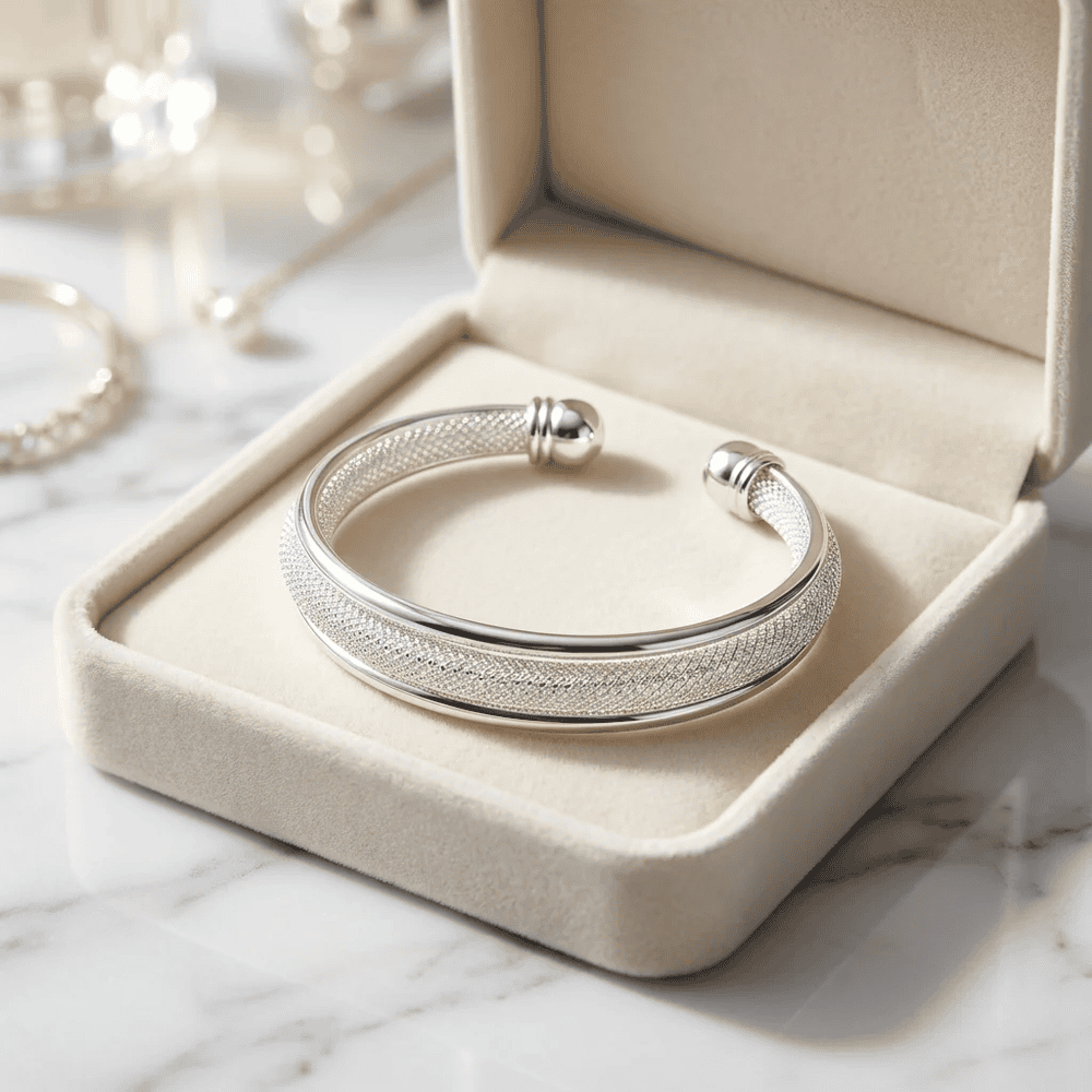 Ezüstös csavart karperec