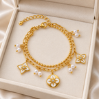 Kétsoros gyöngyös és virágos nemesacél karkötő gold – lifestyle 2