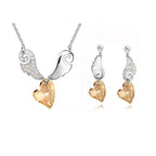 Szárnyas nyaklánc+fülbevaló szett pezsgő Swarovski szívvel