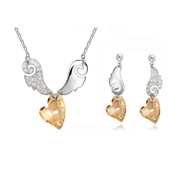 Szárnyas nyaklánc+fülbevaló szett pezsgő Swarovski szívvel