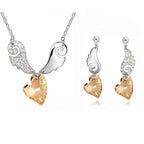 Szárnyas nyaklánc+fülbevaló szett pezsgő Swarovski szívvel