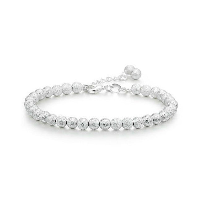 Ezüstös gyöngyös karkötő