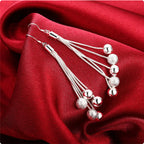 Ibtissem ezüstös bogyós fülbevaló