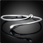 Extravagáns ezüstös karkötő