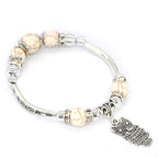 Ezüstös vintage bagoly karlánc fehér