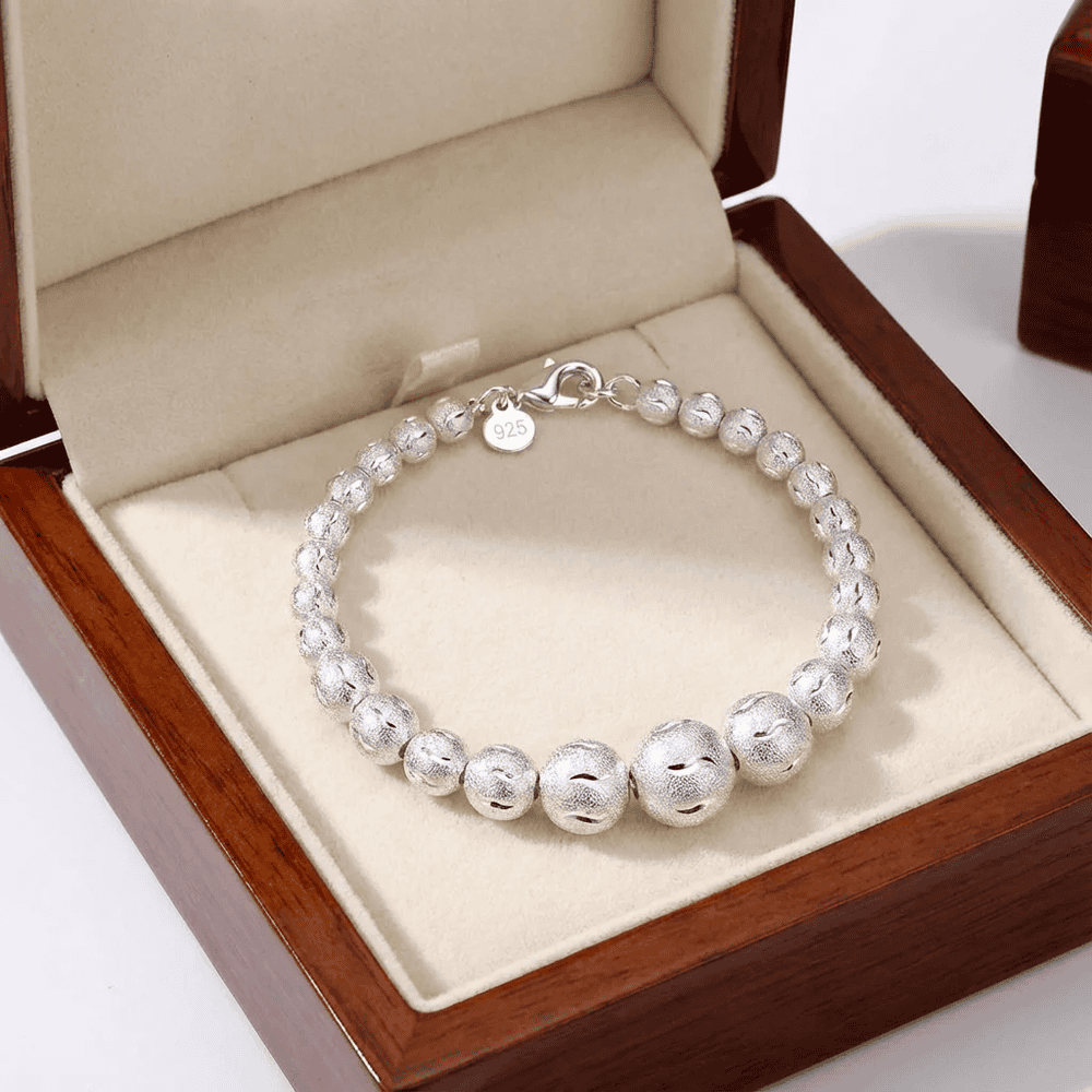 Ezüstös labdák karkötő