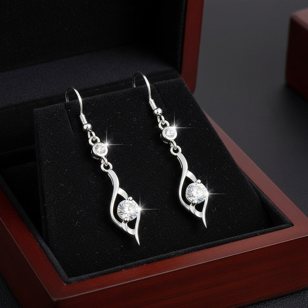 Csavart lógós fülbevaló whitegold