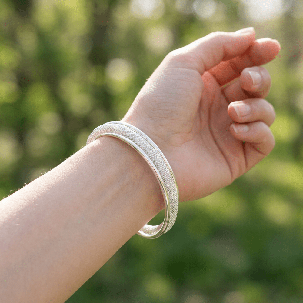 Ezüstös csavart karperec